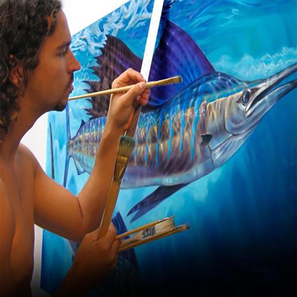 jason mathias painting a boat wrap
